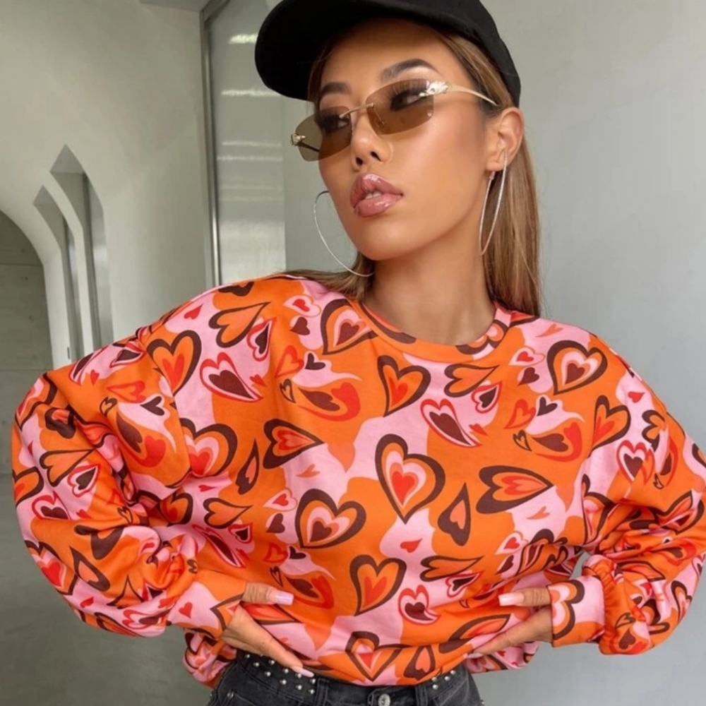 NEW-never been worn. SHEIN Drop shoulder Allover heart pullover.  No tags